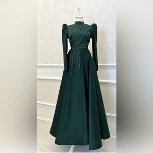 Worm once, beautiful emerald green gown.